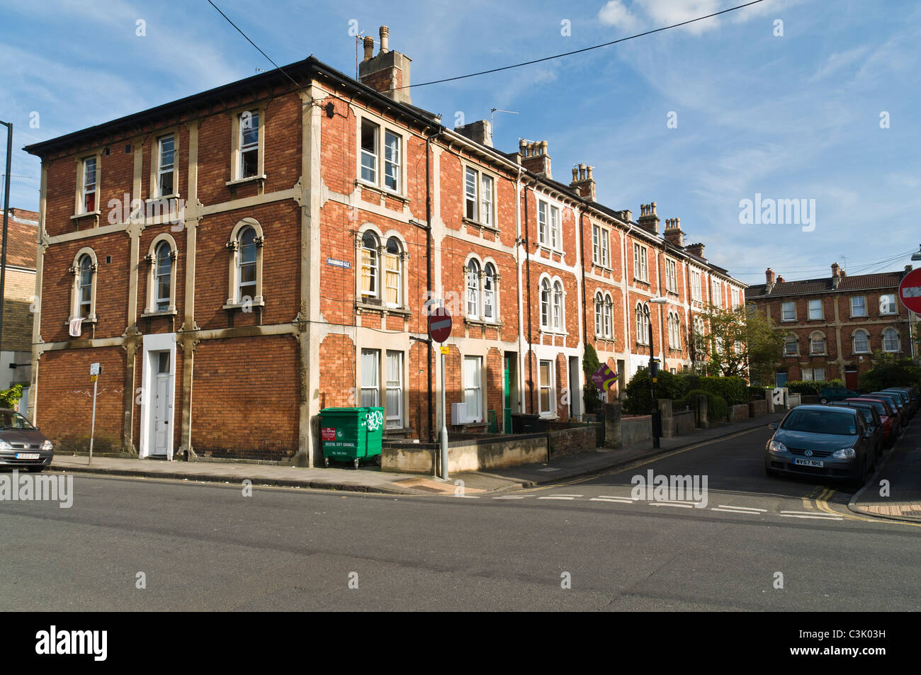 dh terraced town houses CLIFTON BRISTOL ENGLAND Red brick property homes house housing street uk building exterior Stock Photo