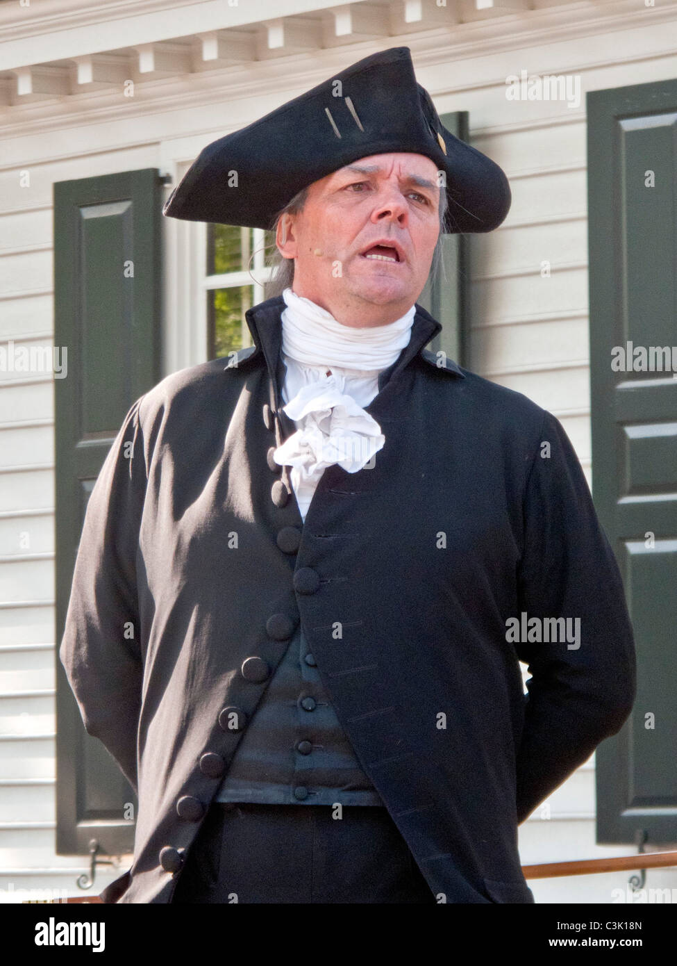 An actor portraying George Washington delivers a speech outside the Raleigh Tavern in Colonial Williamsburg, VA. Stock Photo