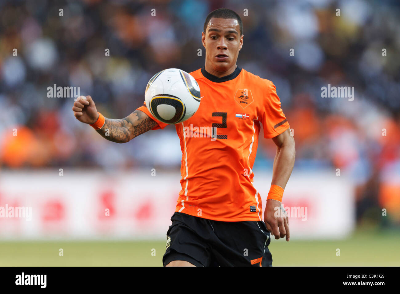 Gregory van der Wiel of the Netherlands eyes the ball during a