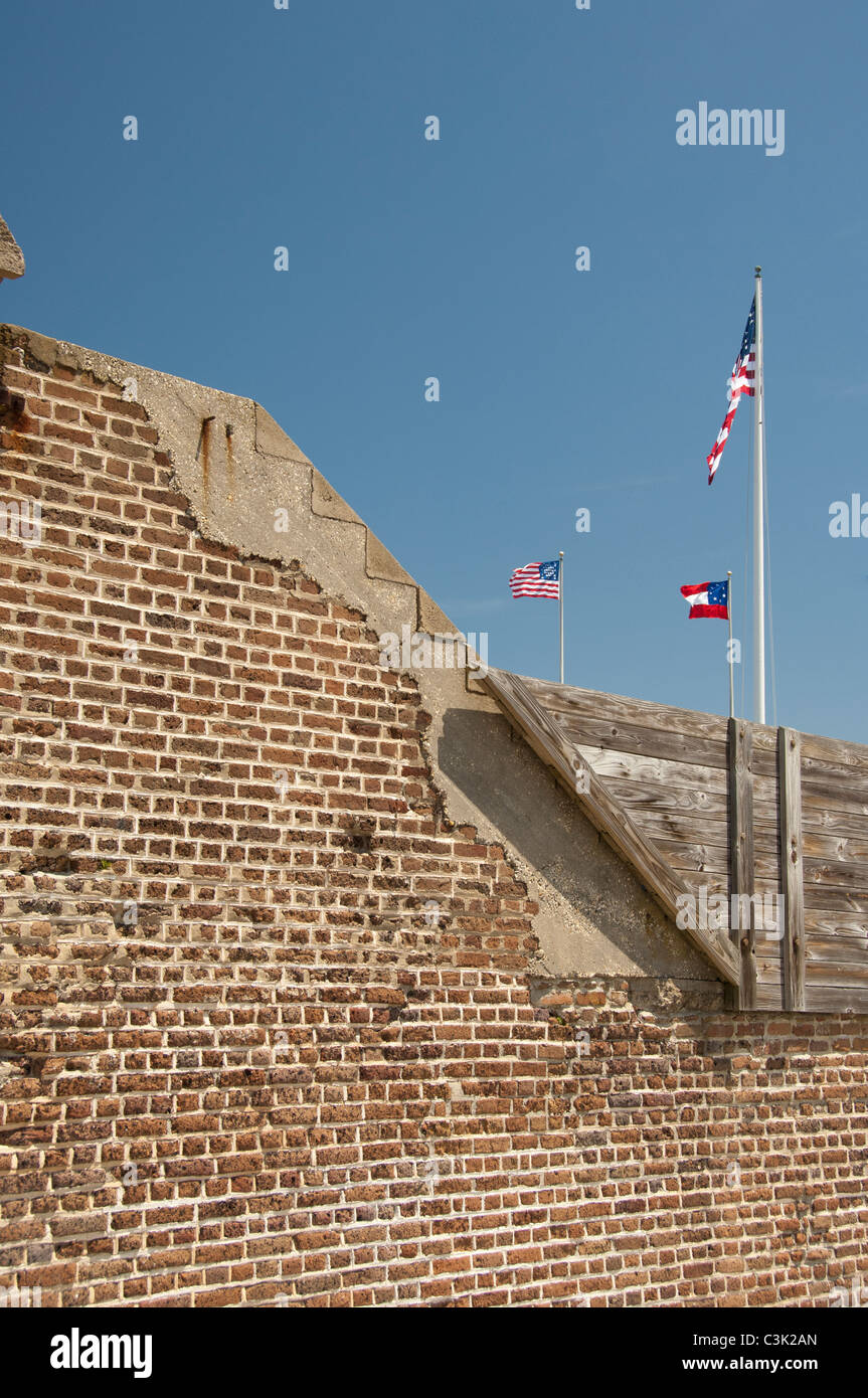 South Carolina, Charleston, Fort Sumter National Monument. Historic fort walls and battle flags. Stock Photo