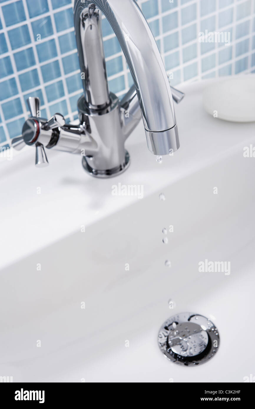 Dripping faucet of a sink, close up Stock Photo Alamy