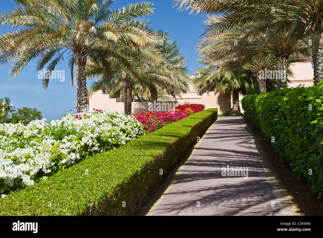 Outdoor gardens and tropical foliage at the Barr Al Jissah resort near Muscat, Oman. Stock Photo