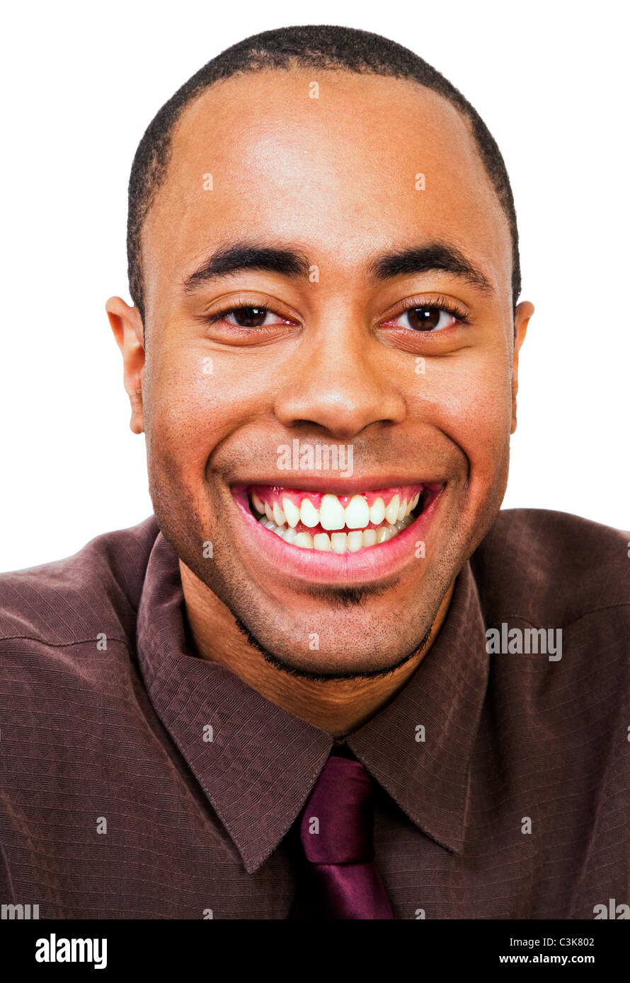 Smiling young man posing isolated over white Stock Photo - Alamy