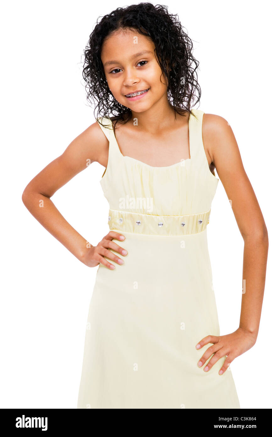 Girl standing with hand on hip isolated over white Stock Photo - Alamy