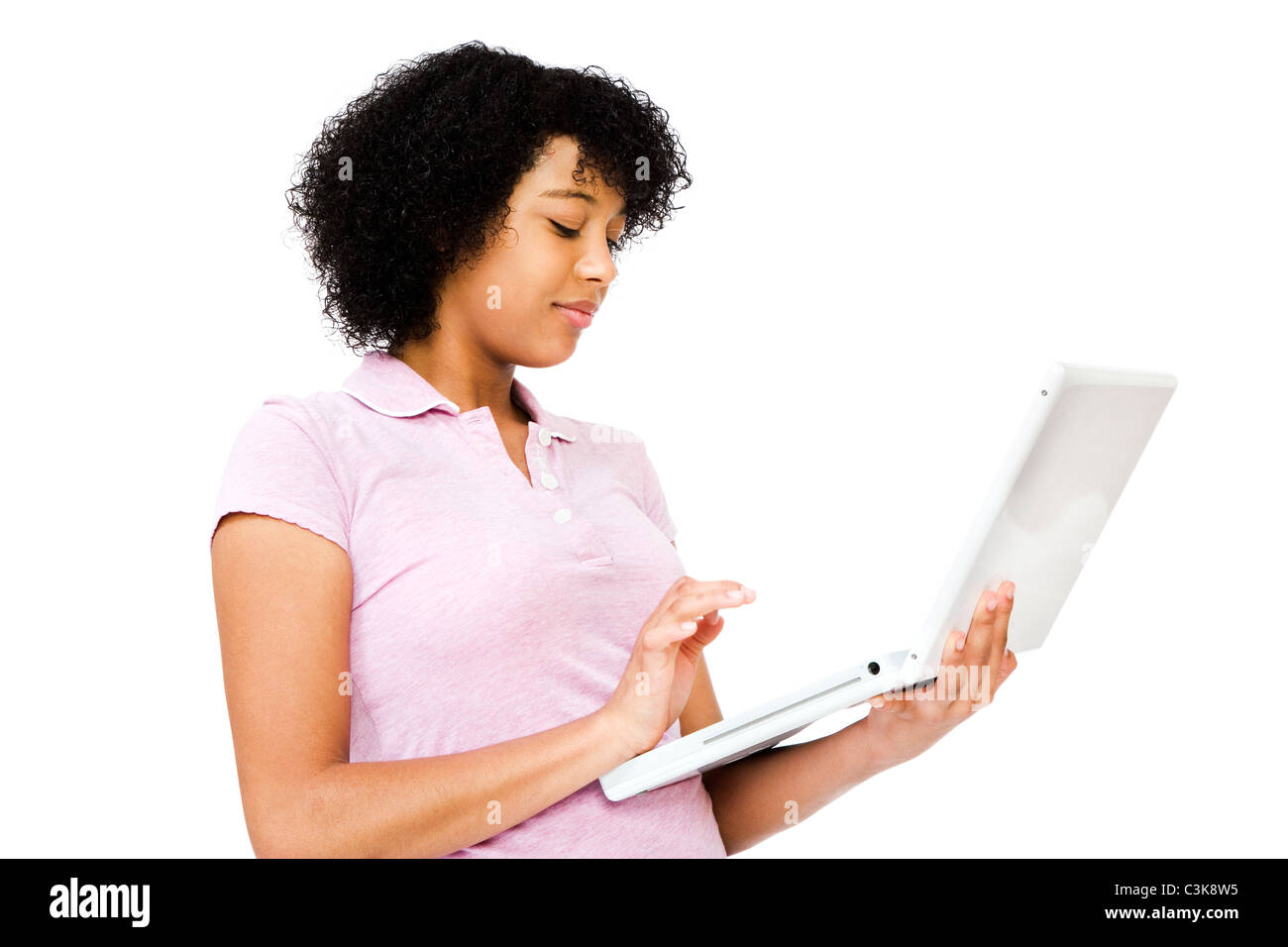 African teenage girl using a laptop isolated over white Stock Photo - Alamy