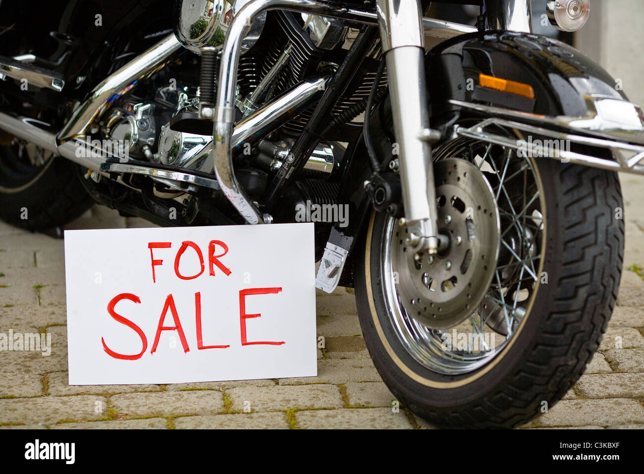 Vintage motorbike with for sale sign Stock Photo
