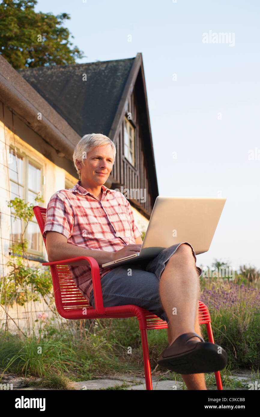 Man in front of laptop hi-res stock photography and images - Alamy