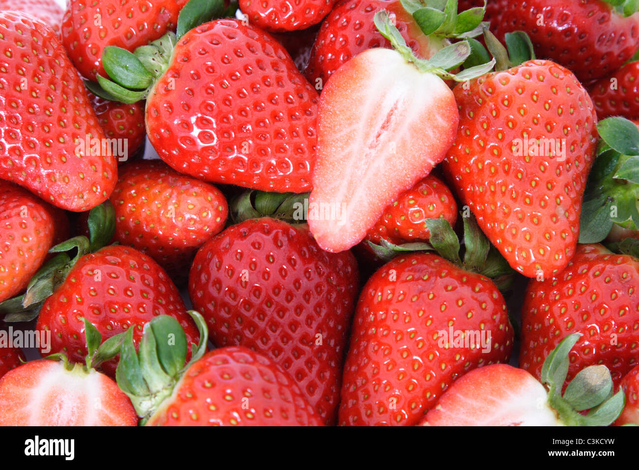 Pile of fresh ripe strawberries. All on white background Stock Photo ...