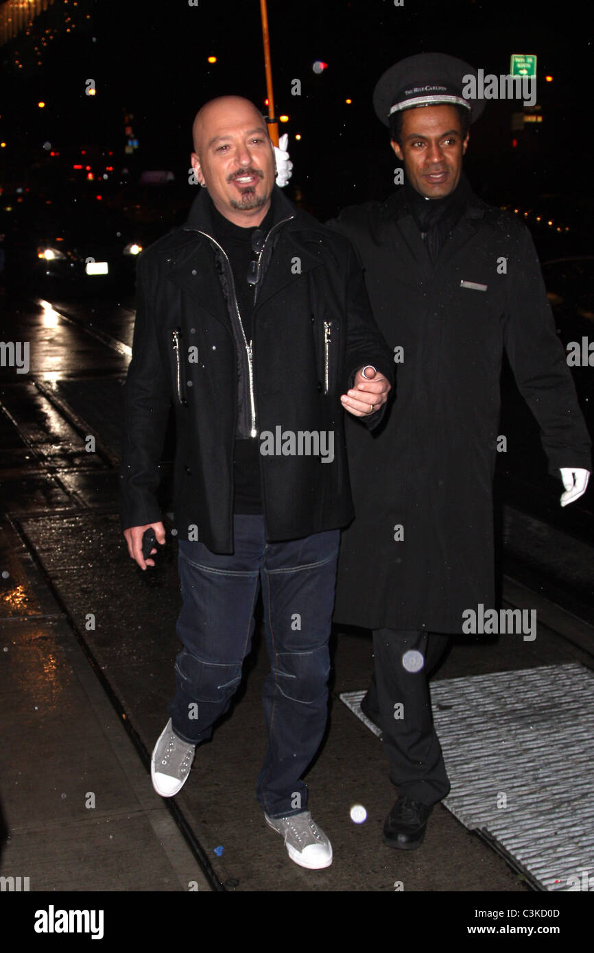 Howie Mandel 'Deal or No Deal' host Howie Mandel seen walking in Midtown in the rain. New York City, USA - 02.12.09 Stock Photo