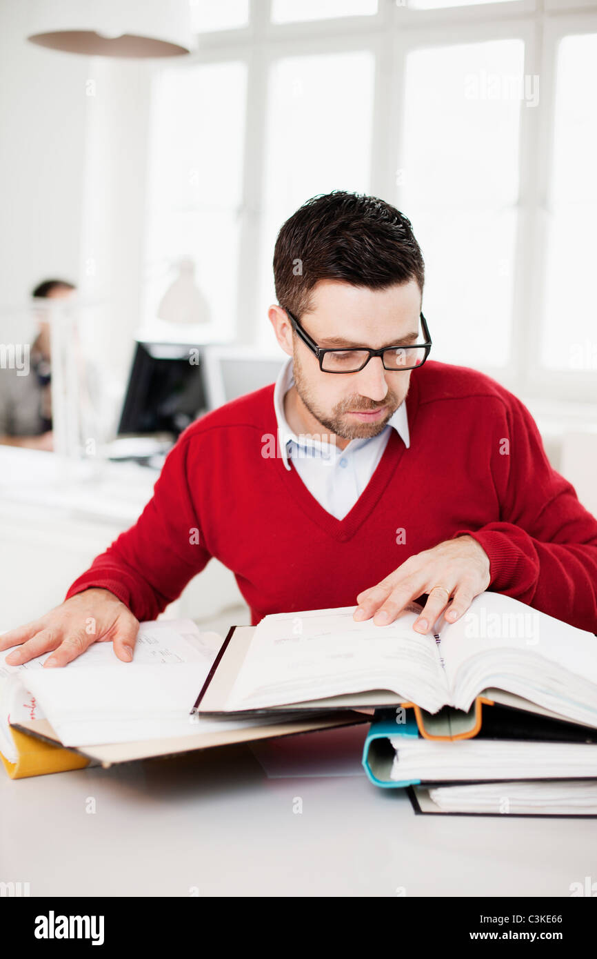 Man working in office Stock Photo - Alamy