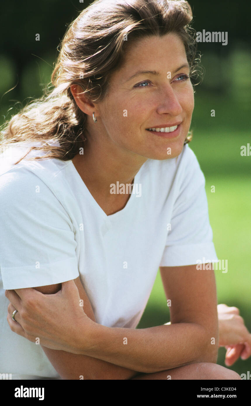 one-contemplative-mature-woman-close-hi-res-stock-photography-and