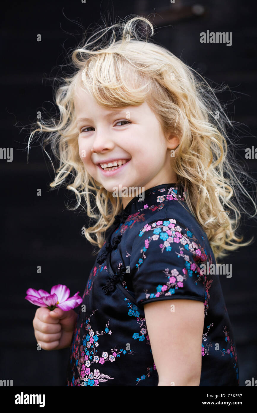 Portrait of girl smiling Stock Photo - Alamy