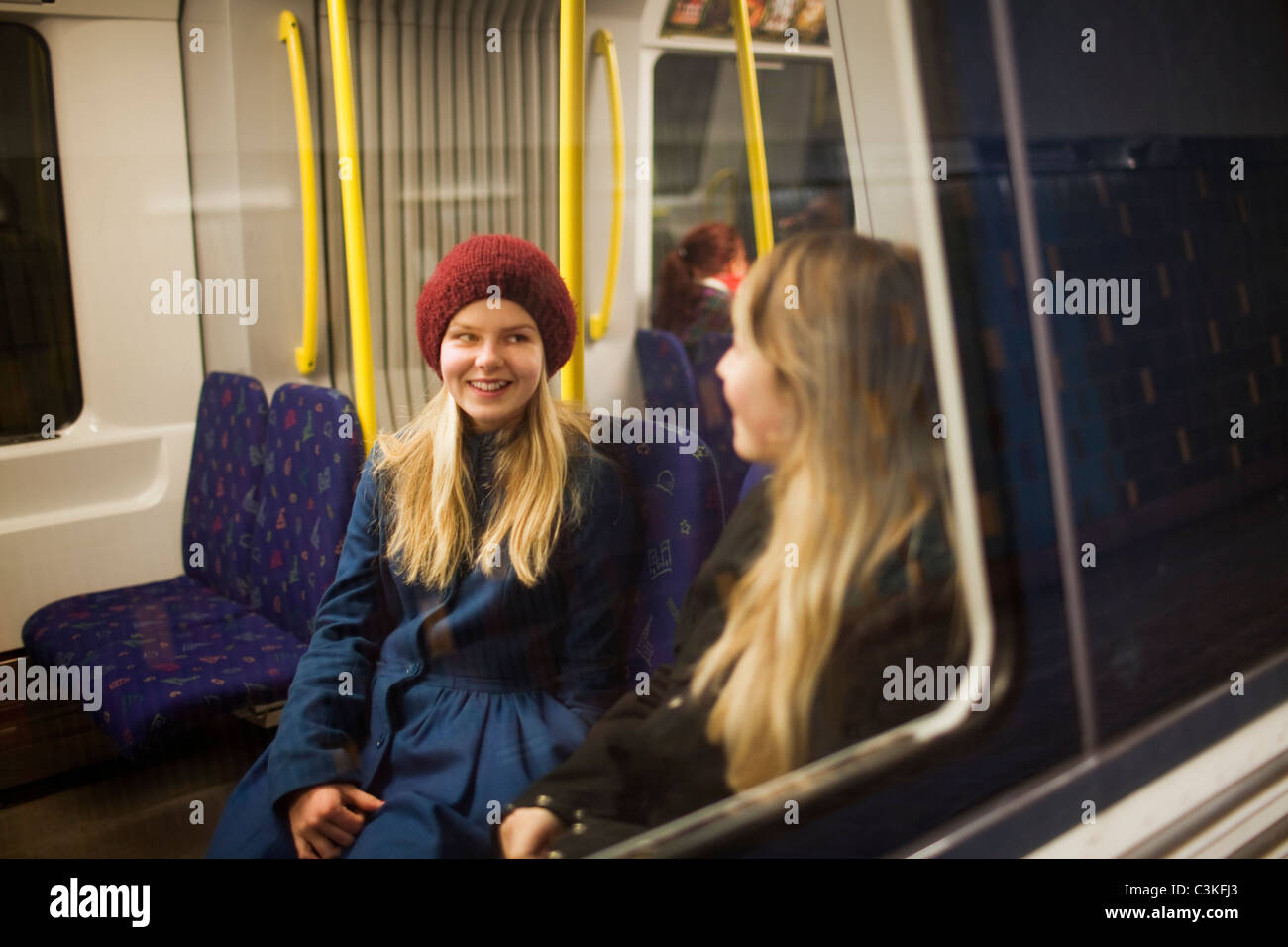 Teenage girls sitting on train hires stock photography and images Alamy