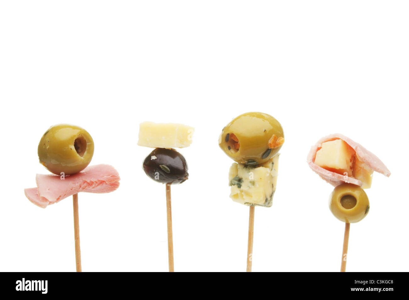 Olive, cheese and ham party nibbles on cocktail sticks Stock Photo Alamy