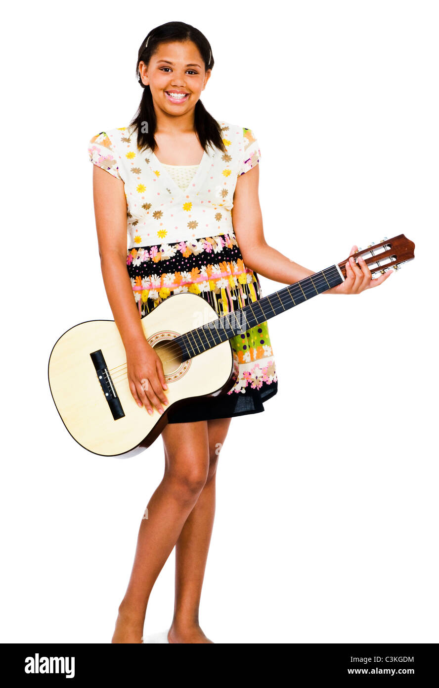 Teenage girl standing playing guitar Cut Out Stock Images & Pictures - Alamy