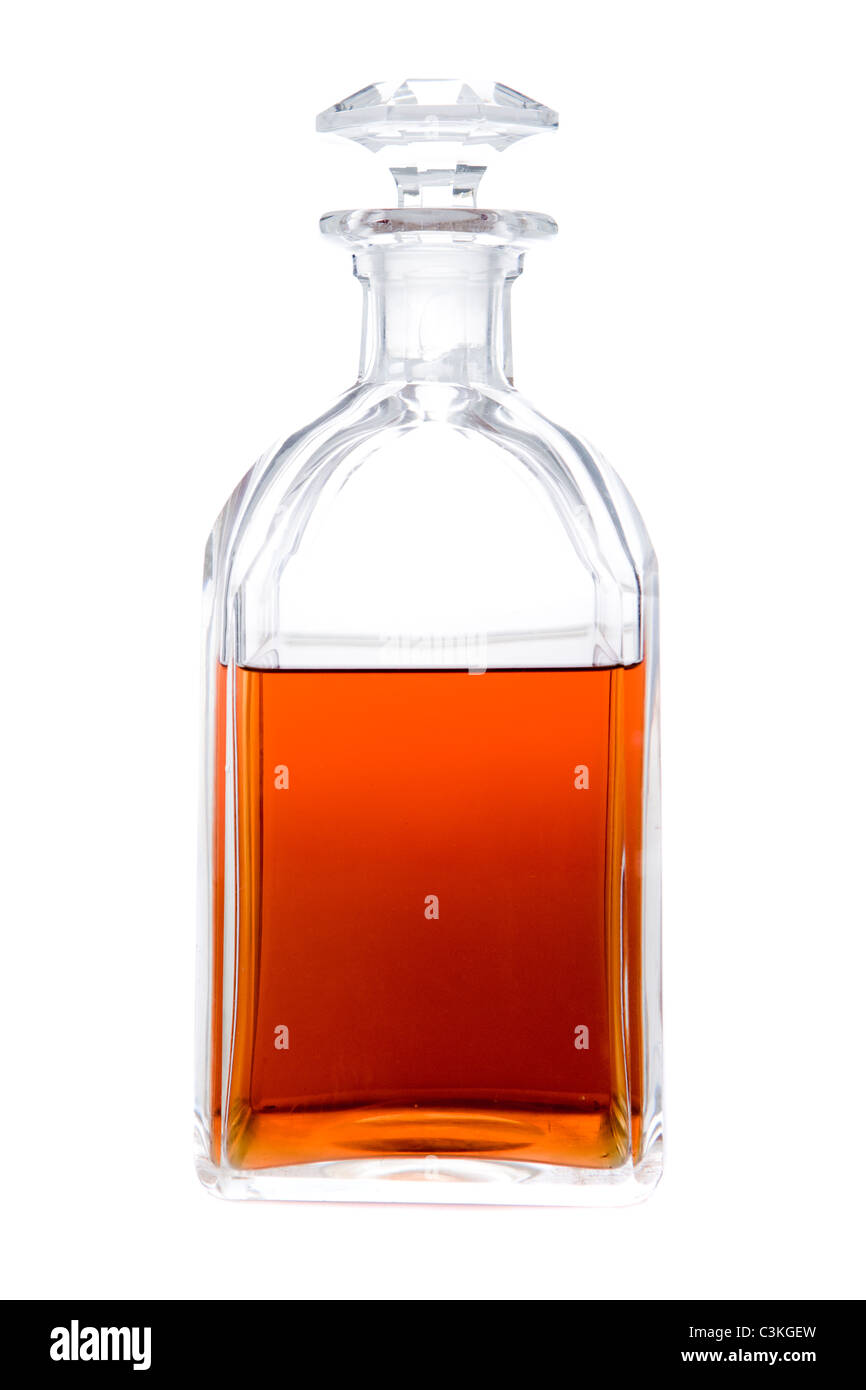 Bottle of cognac against white background, close-up Stock Photo