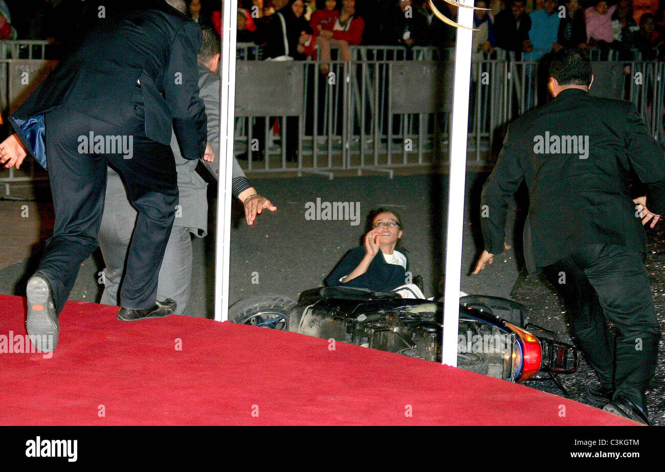 Young woman in a scooter fell while on the red carpet 9th International ...