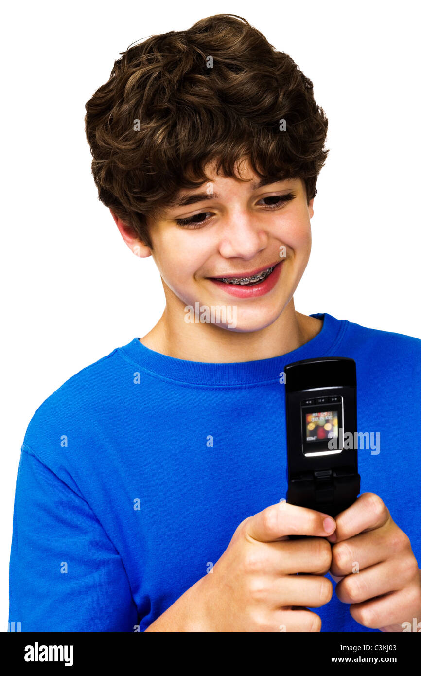 Boy Send Msg Smiling boy text messaging on a mobile phone isolated over white Stock ...
