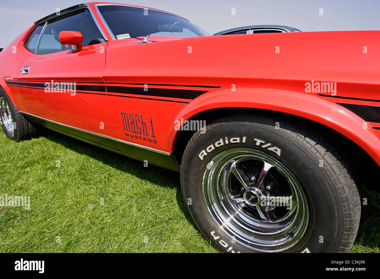 A low angle view of a classic Ford Mustang Mach 1 American sports car Stock Photo