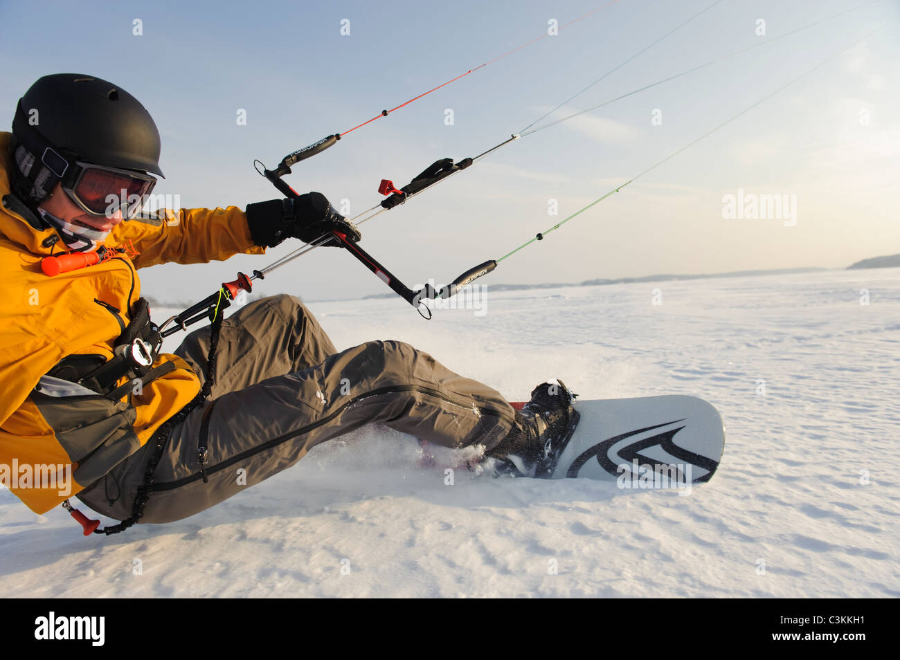 Man kiteboarding in snow Stock Photo