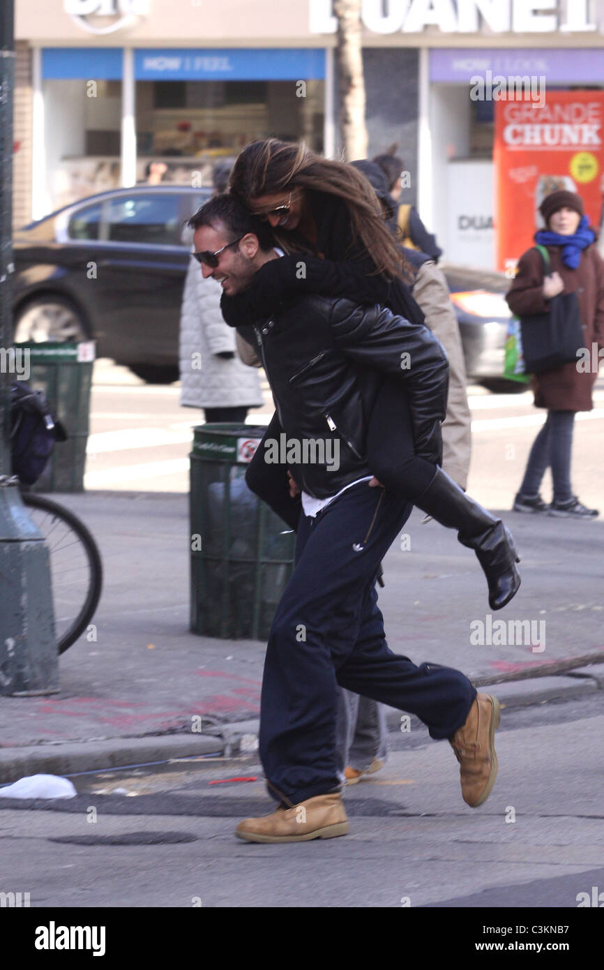 Tiger Woods' alleged mistress Rachel Uchitel gets a piggyback ride to ...