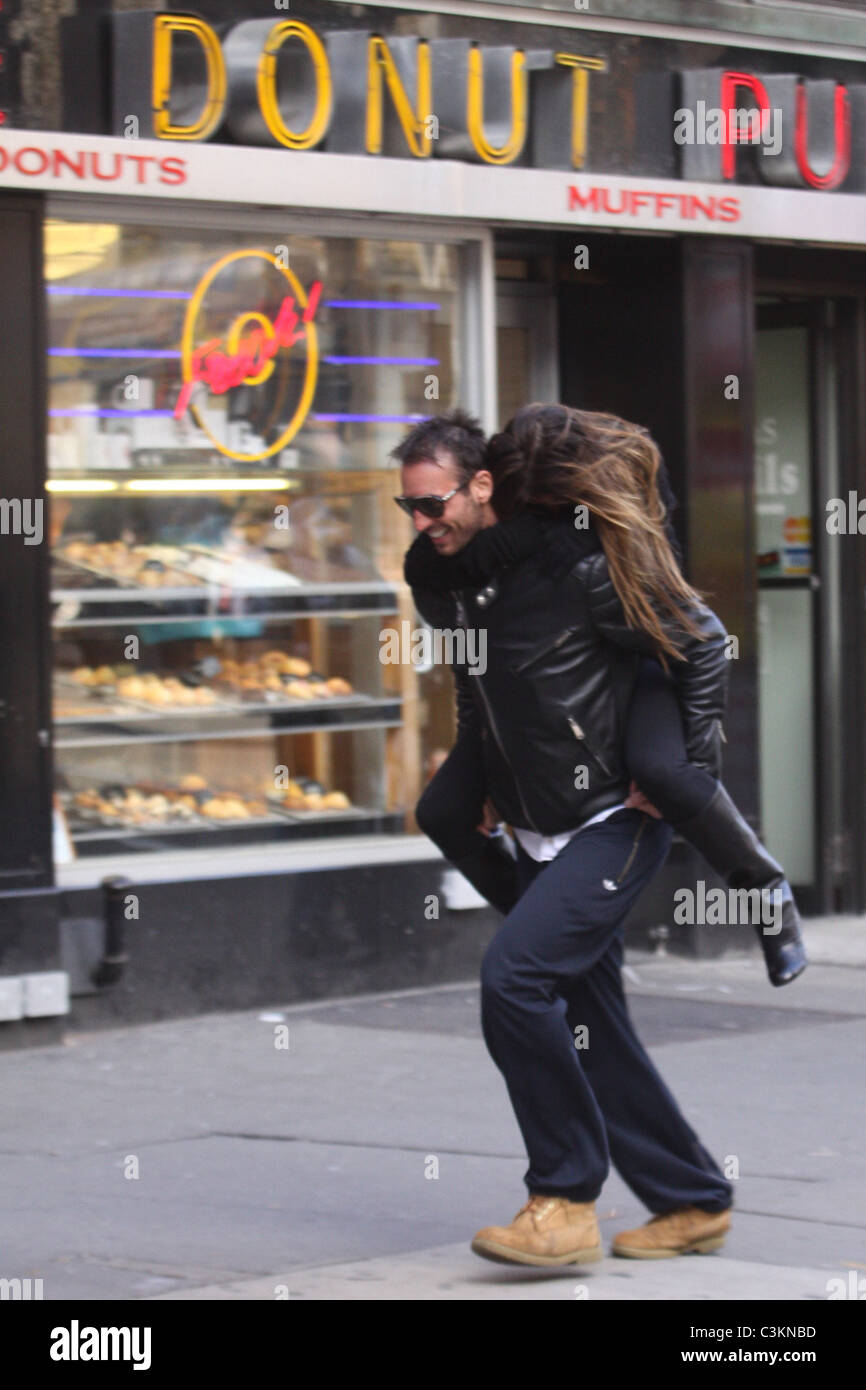 Tiger Woods' alleged mistress Rachel Uchitel gets a piggyback ride to ...