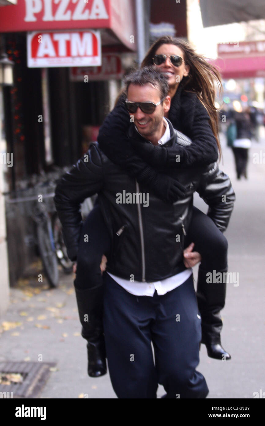 Tiger Woods' alleged mistress Rachel Uchitel gets a piggyback ride to ...