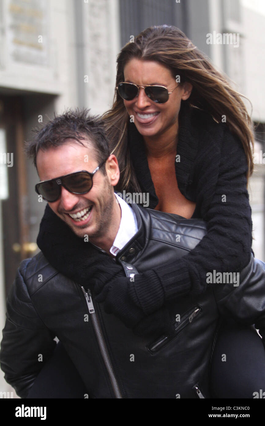 Tiger Woods' alleged mistress Rachel Uchitel gets a piggyback ride to ...