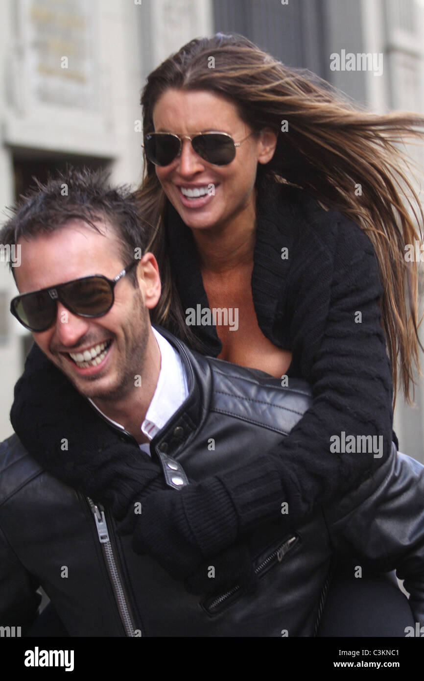 Tiger Woods' alleged mistress Rachel Uchitel gets a piggyback ride to ...