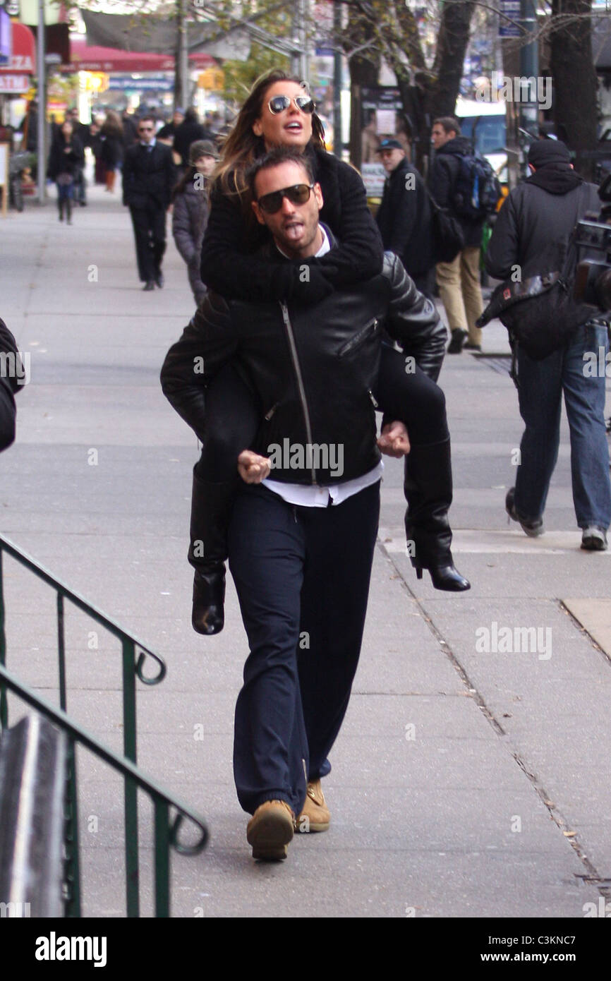 Tiger Woods' alleged mistress Rachel Uchitel gets a piggyback ride to ...