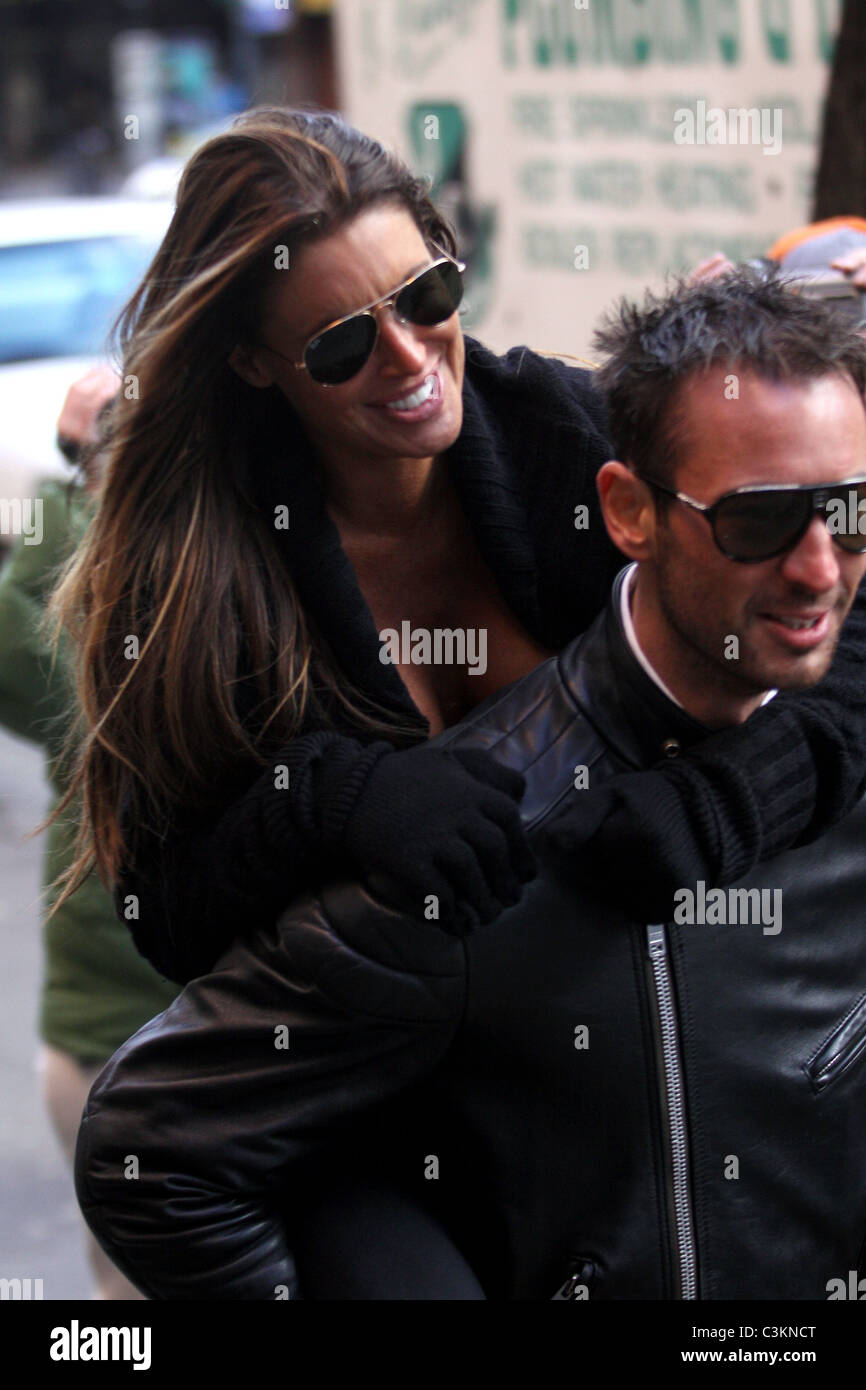 Tiger Woods' alleged mistress Rachel Uchitel gets a piggyback ride to ...