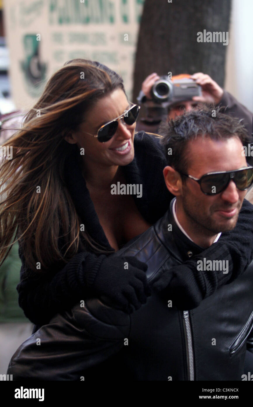 Tiger Woods' alleged mistress Rachel Uchitel gets a piggyback ride to ...