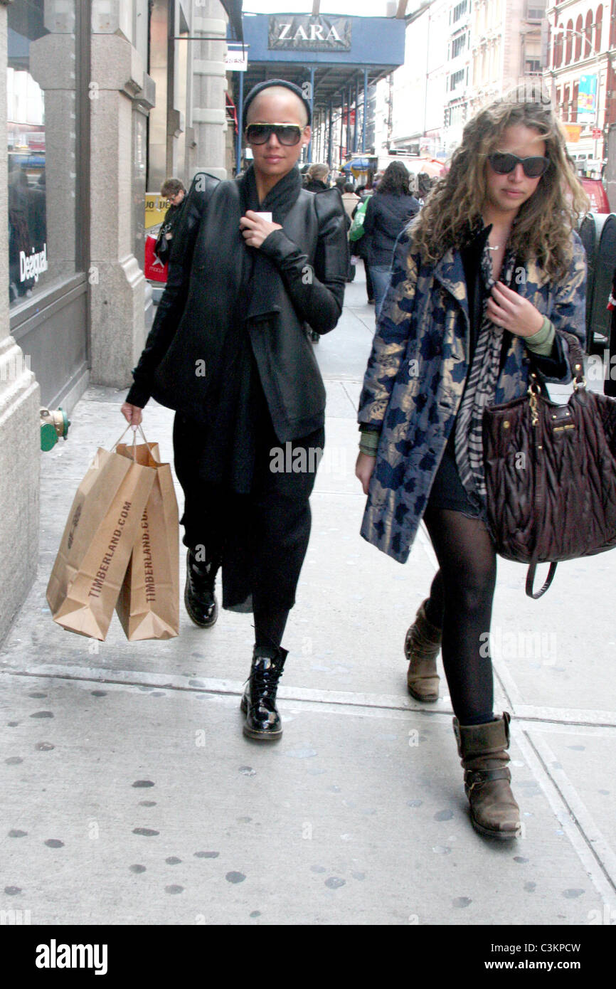 Amber Rose shopping in SoHo with a friend while wearing Dr. Martens boots  New York City, USA - 10.12.09 Anthony Dixon Stock Photo - Alamy