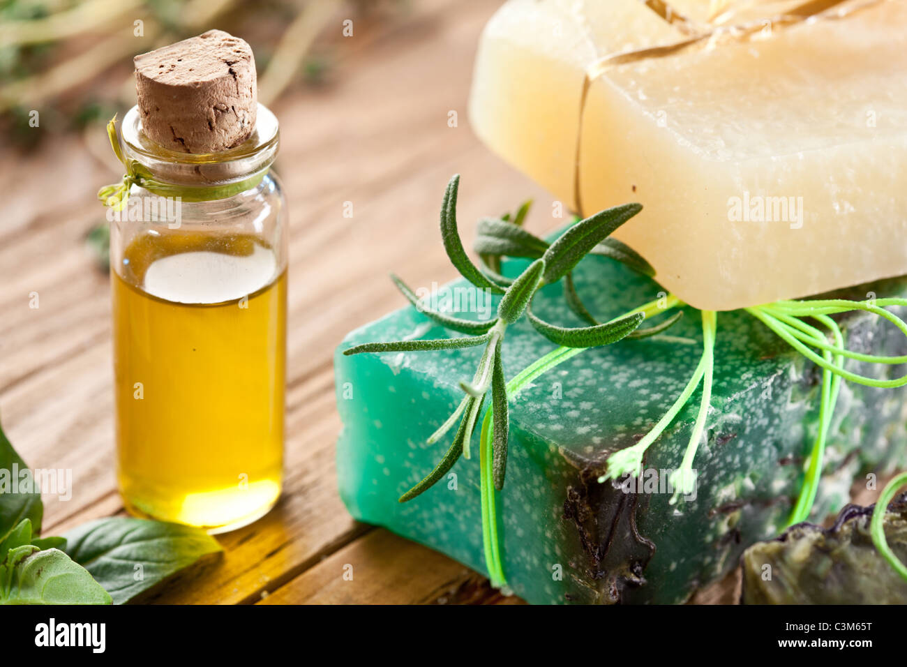 Piece of natural soap with oil and herbs Stock Photo Alamy