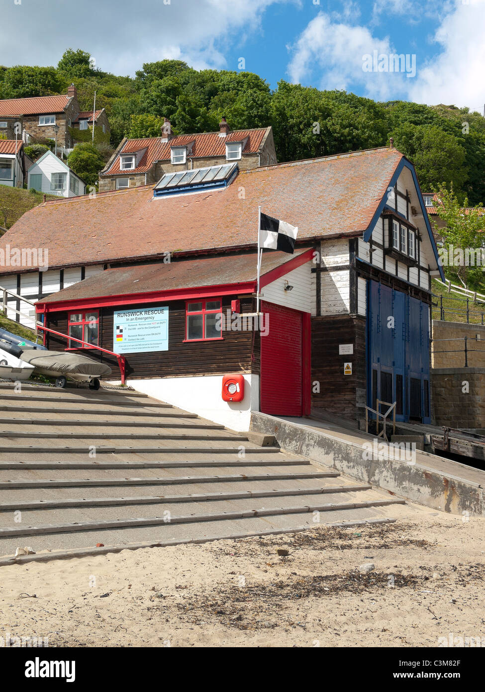 Normally unmanned marine rescue station in the village of Runswick Bay North Yorkshire England Stock Photo