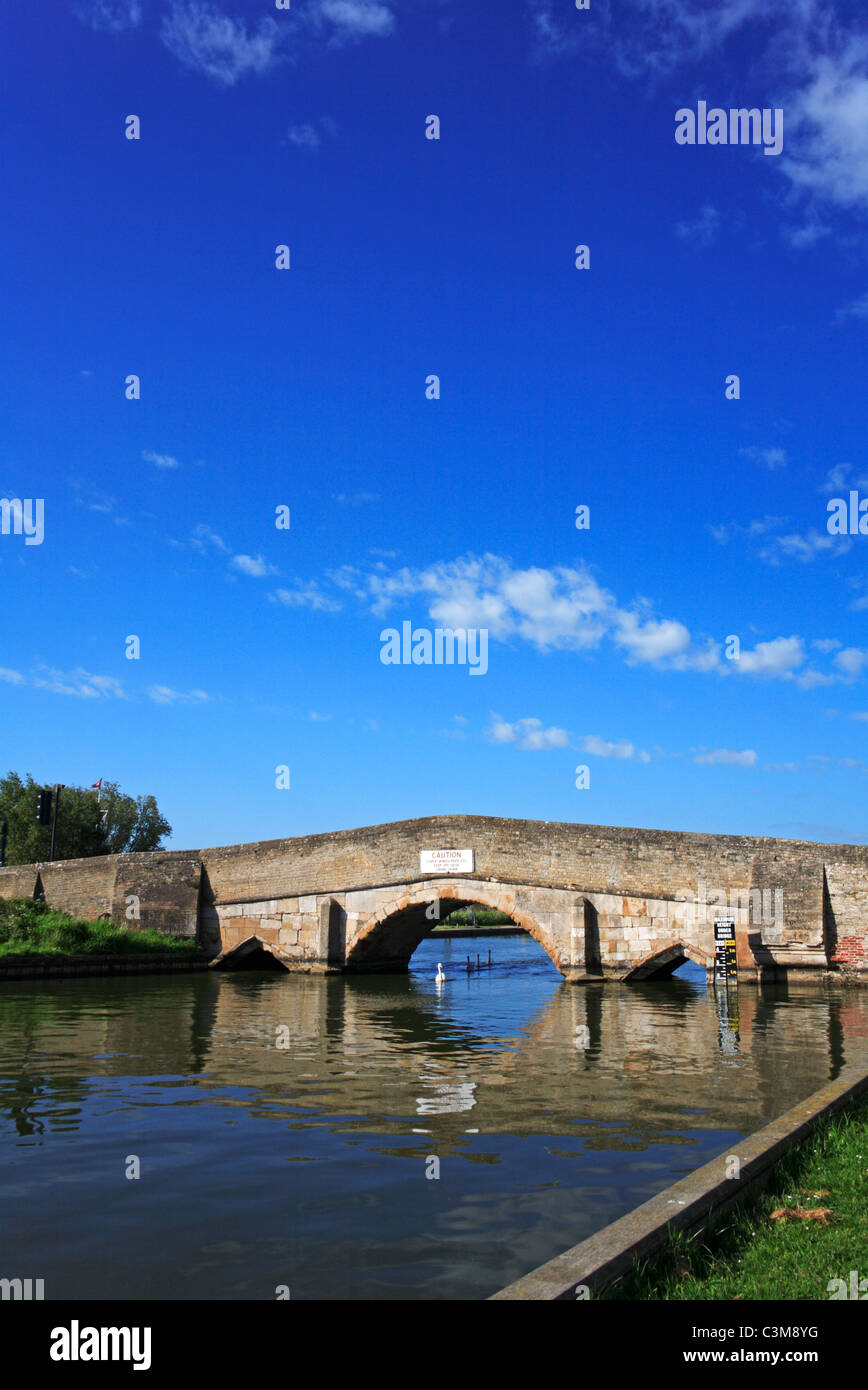 Old medieval bridge over the River Thurne at Potter Heigham, Norfolk, England, United Kingdom