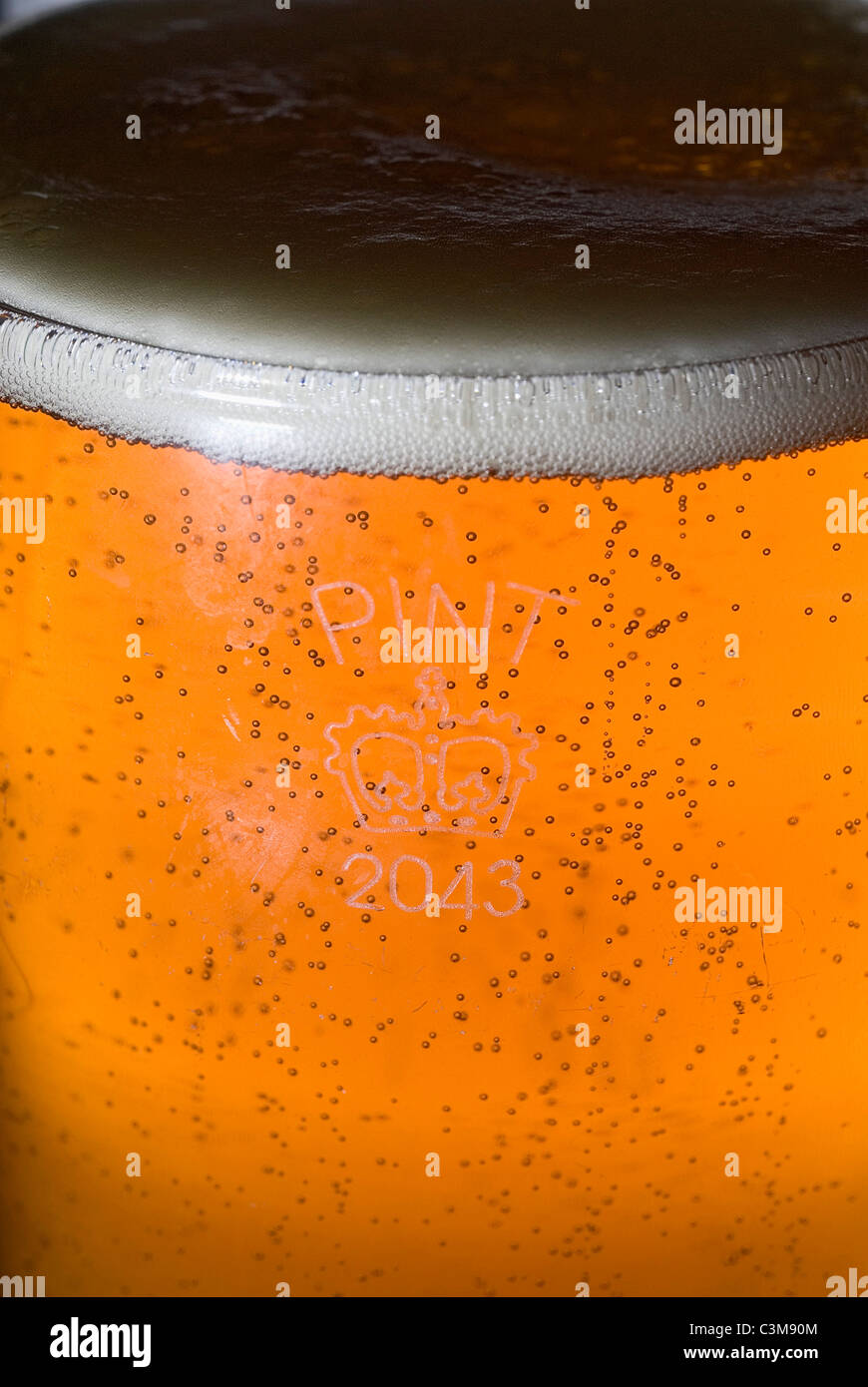 UK PINT BEER GLASS WITH CROWN STAMP Stock Photo