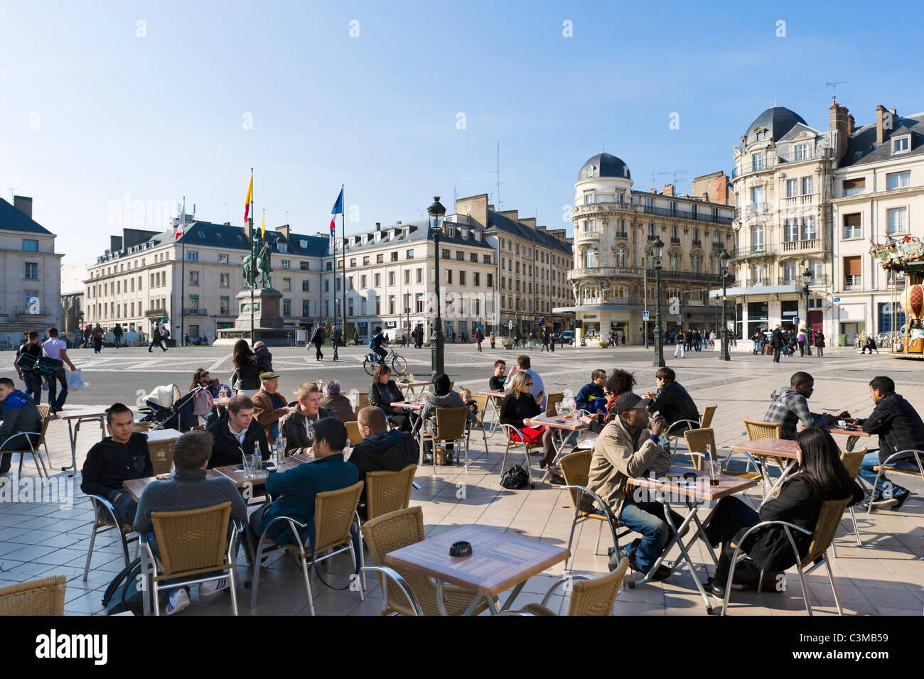 Pavement cafe in front of the statue of Joan of Arc, Place du Martroi, Orleans, France Stock Photo
