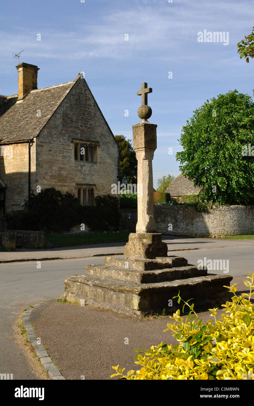 The old cross in Stanton village, Gloucestershire, England, UK Stock Photo