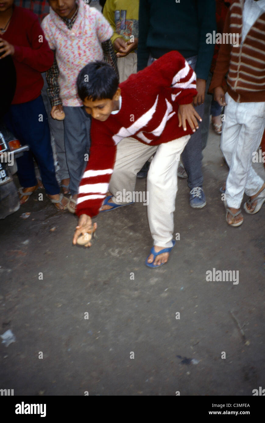 Children playing spinning tops hires stock photography and images Alamy