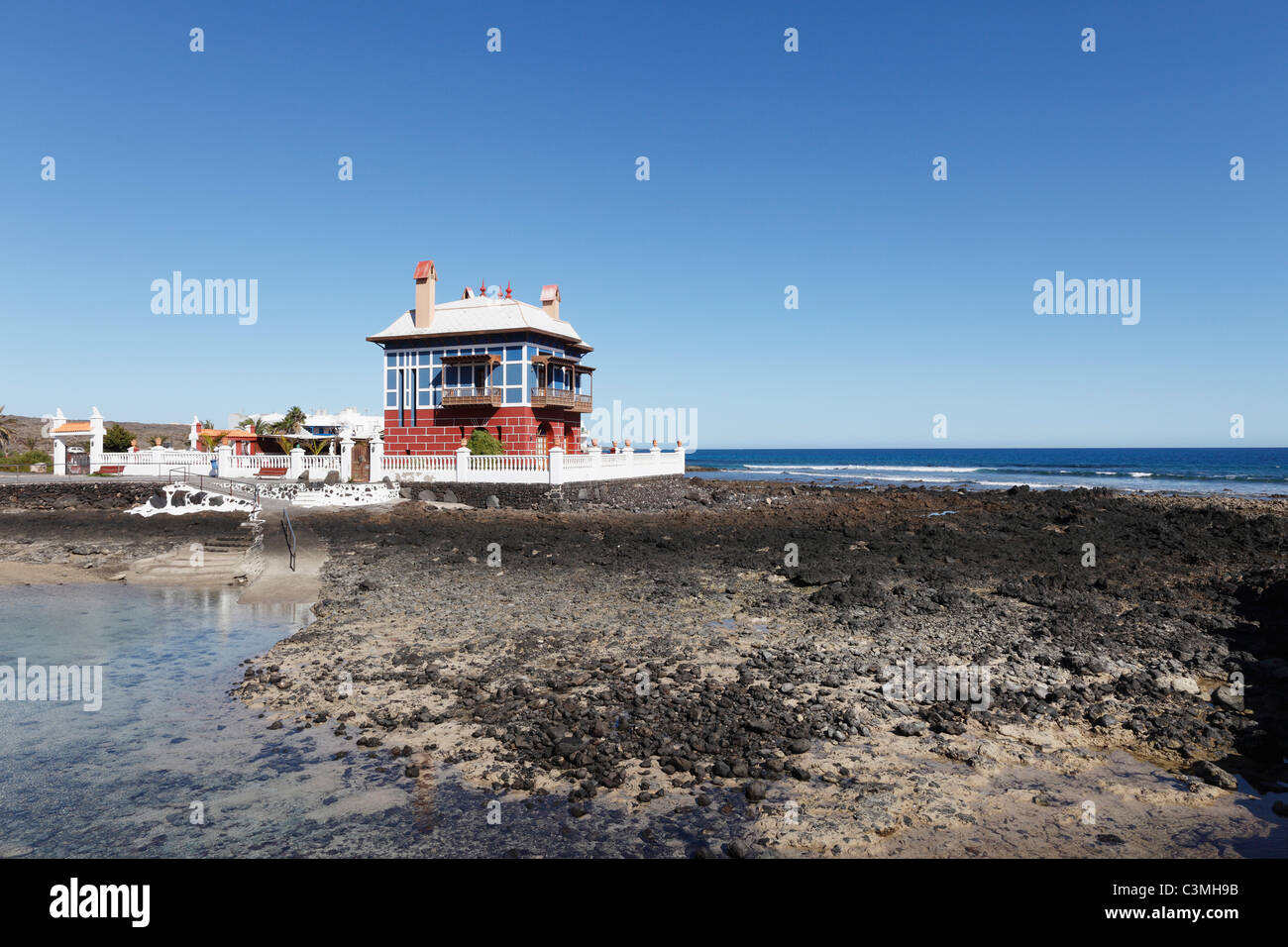 Spain, Canary Islands, Lanzarote, Arrieta, Blue House at sea side Stock Photo