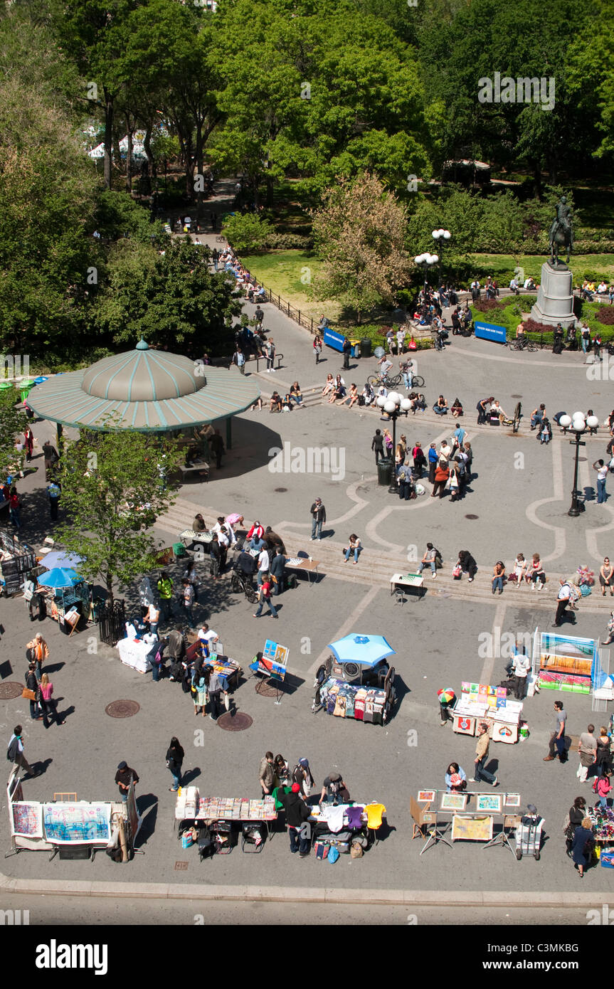 Artists selling their wares mix with students, tourists and New Yorkers in Union Square. Stock Photo