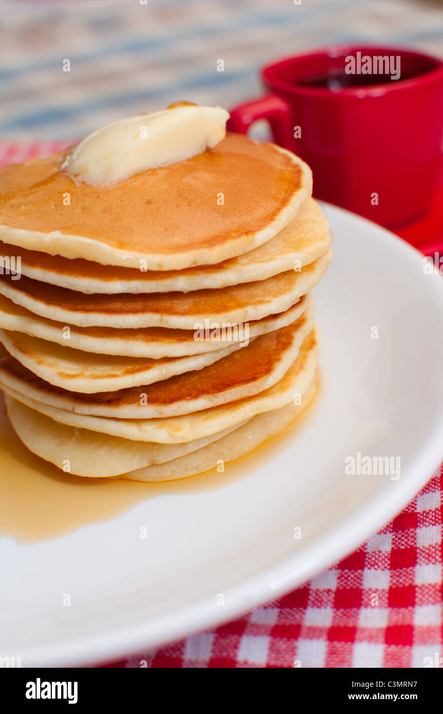 Pancakes With Butter and Maple Syrup Stock Photo