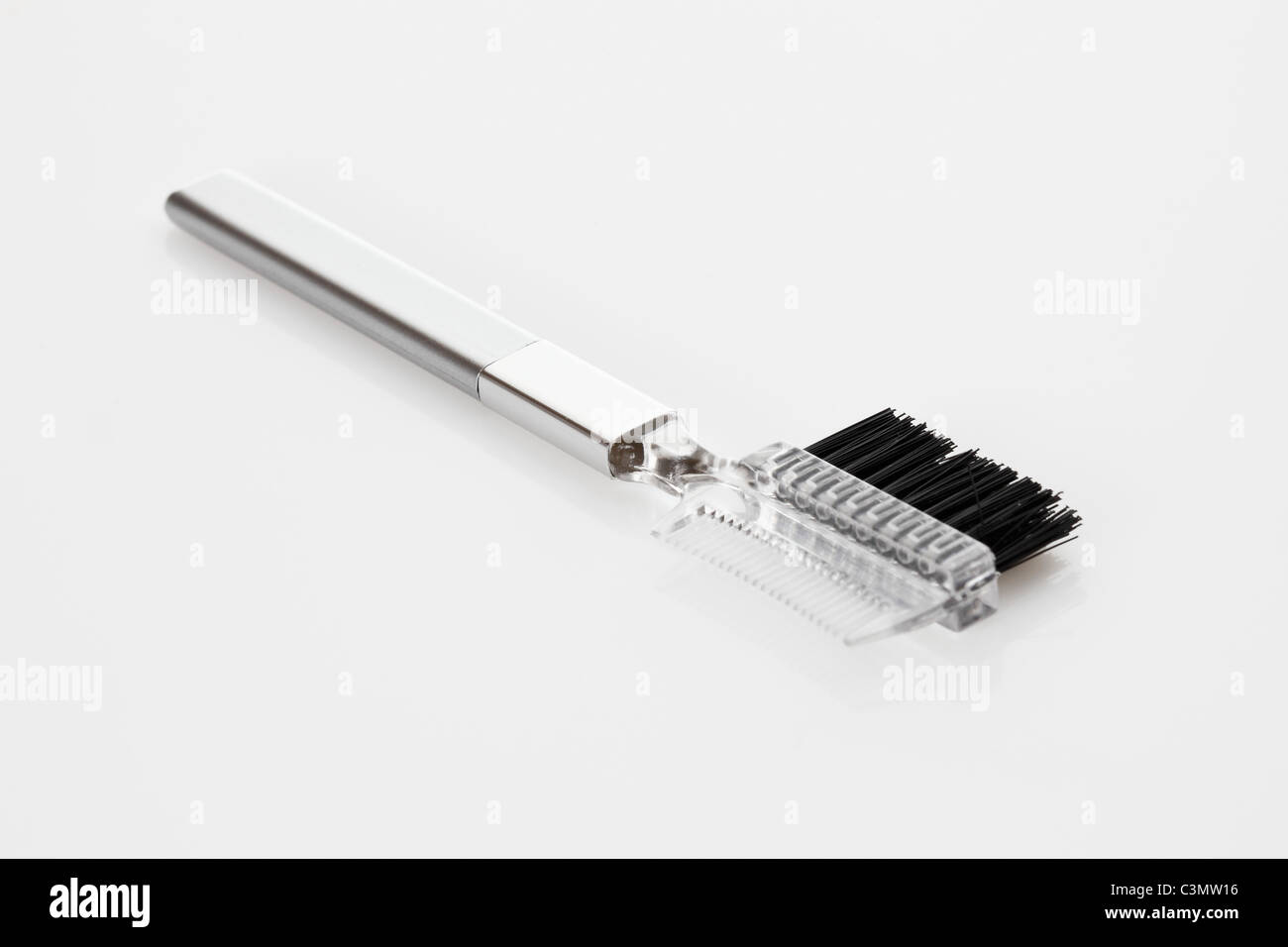 Lash and Brow Comb on white background Stock Photo