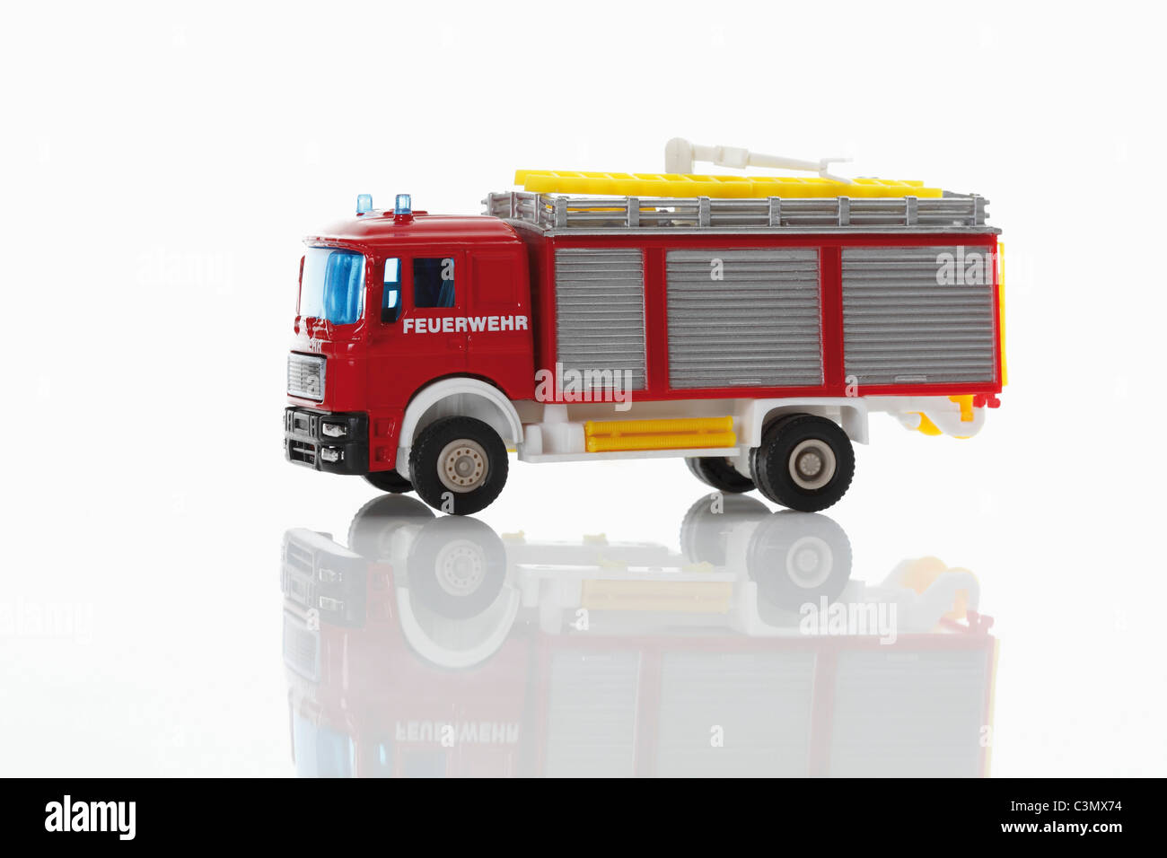 Toy fire truck on white background Stock Photo