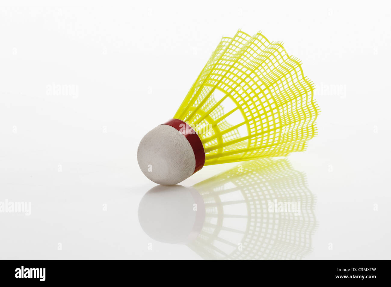 Badminton shuttlecocks on white background Stock Photo - Alamy