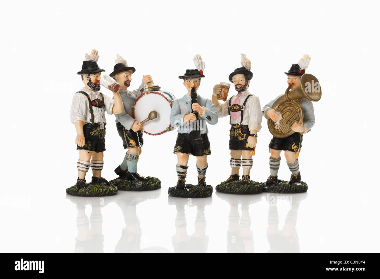 Bavarian figurines enjoying and playing music Stock Photo