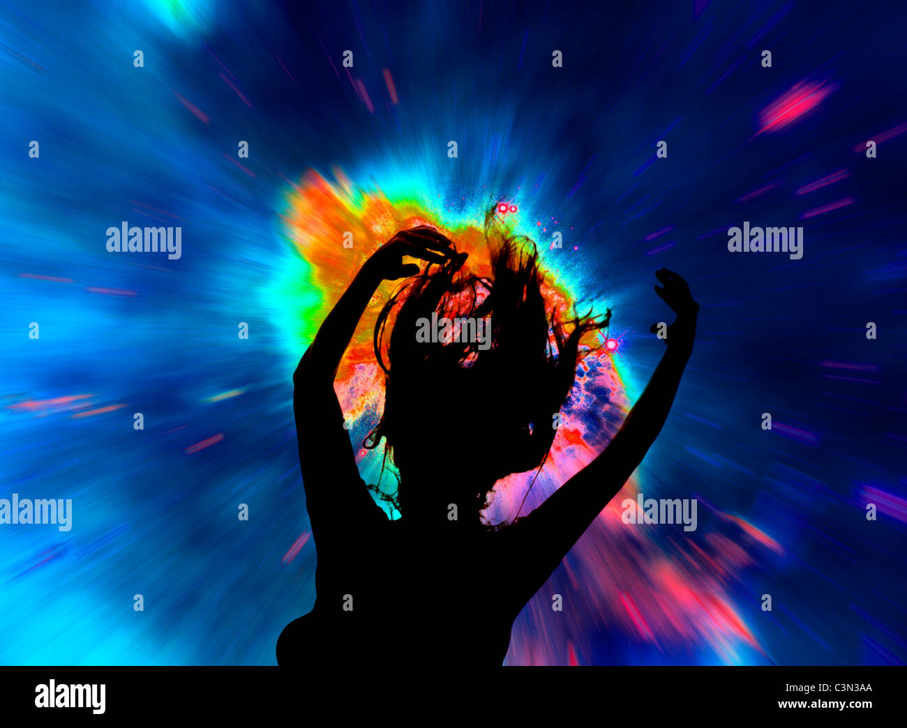 silhouette of  teen-age girl at Rave dance concert Stock Photo