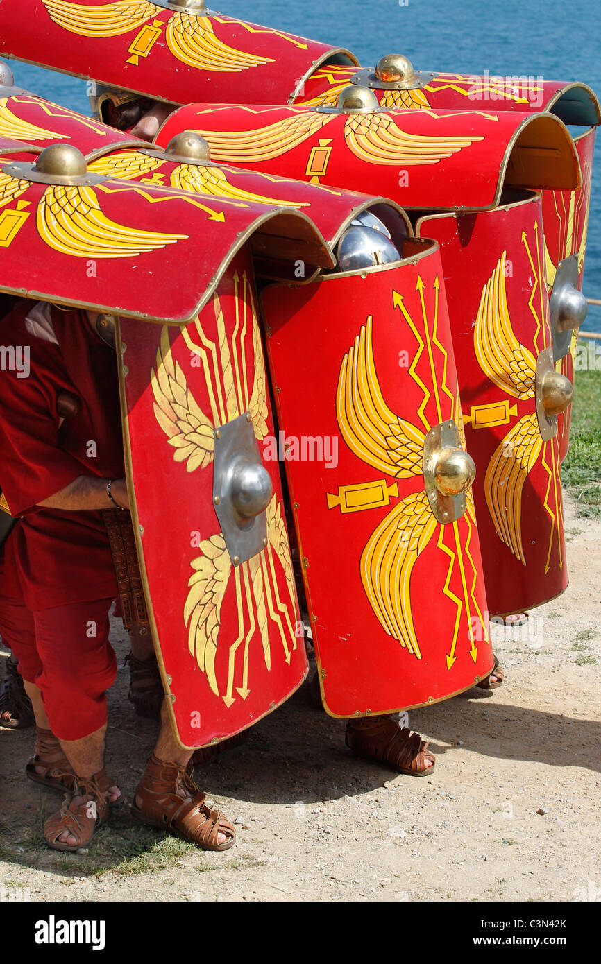 Roman Soldiers demonstrating defensive battle formation using shields