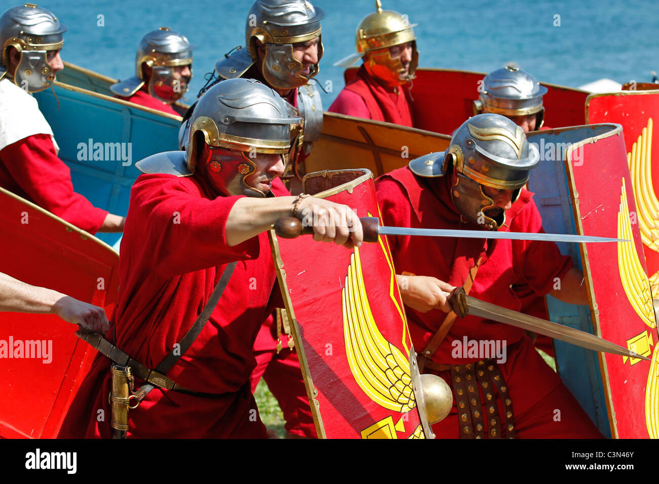 Roman Soldiers demonstrating attacking battle formation Stock Photo - Alamy